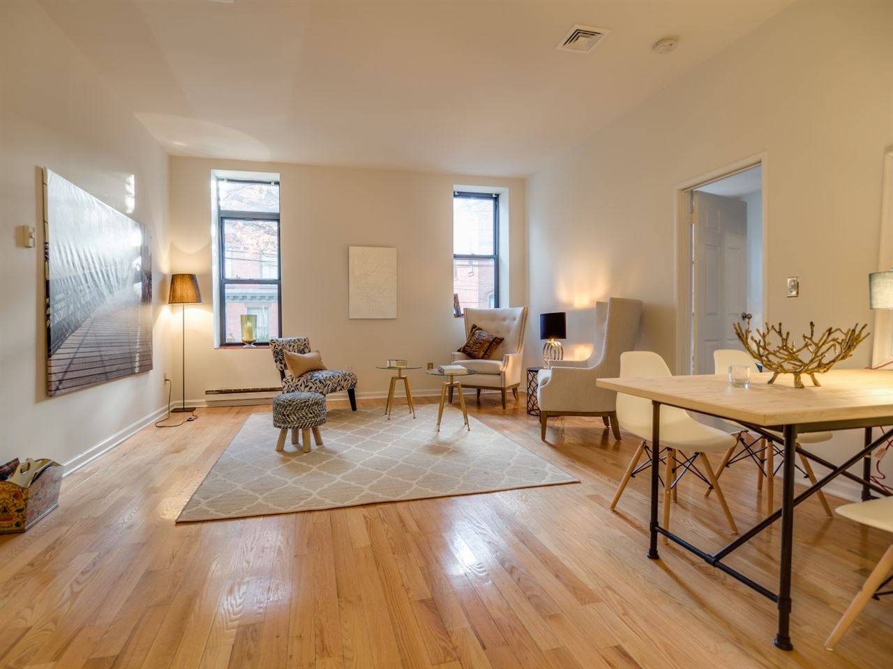 Welcome to this amazing loft style apartment located directly at Van Vorst Park in the downtown neighborhood