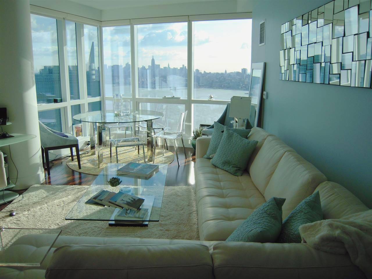 Enjoy Breathtaking panoramic NYC views from this high floor beautifully furnished 1 BR/1