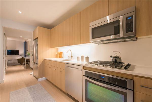 Striking Midtown East 1 Bedroom Apartment with 1 Bath featuring a Fitness Center and Pool