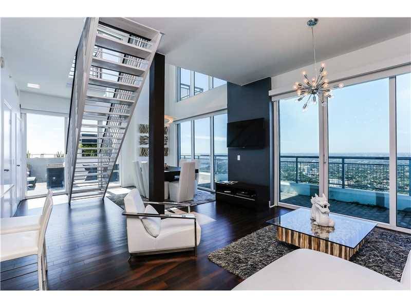SPECTACULAR TWO STORY LOFT CONDO WITH PRIVATE ROOFTOP PATIO
