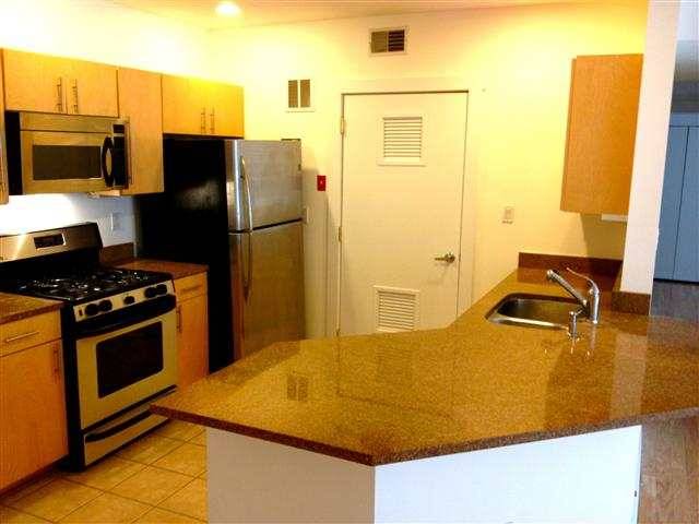 2 bedroom 2 full bath 1200 sq ft condo with covered garage parking and washer/dryer in unit