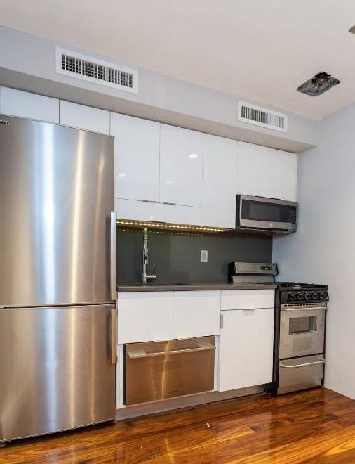 East Village: 2BR with Exposed Brick!