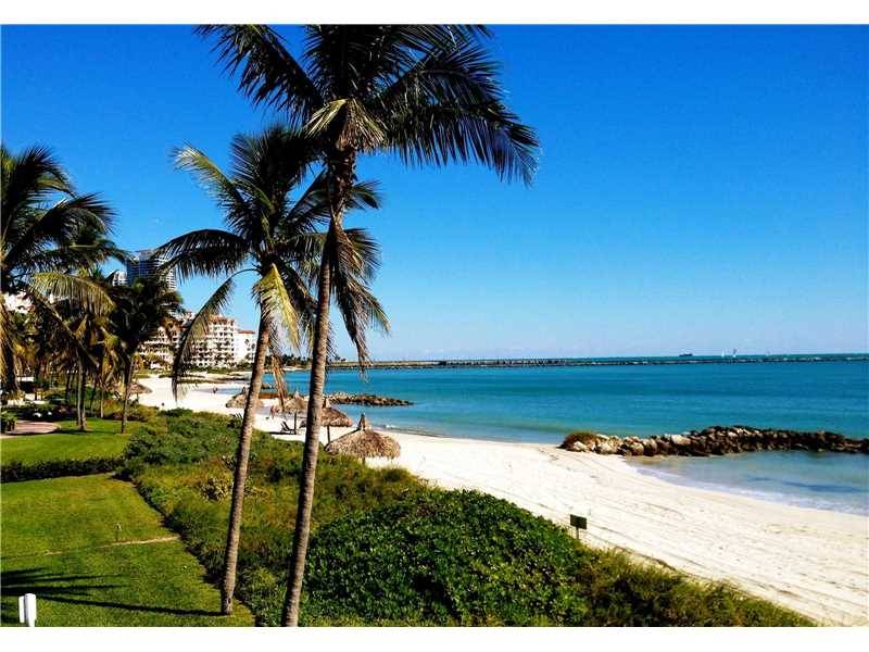 Breathtaking beachfront views from this spacious 4th floor two bedroom rental on Fisher Island