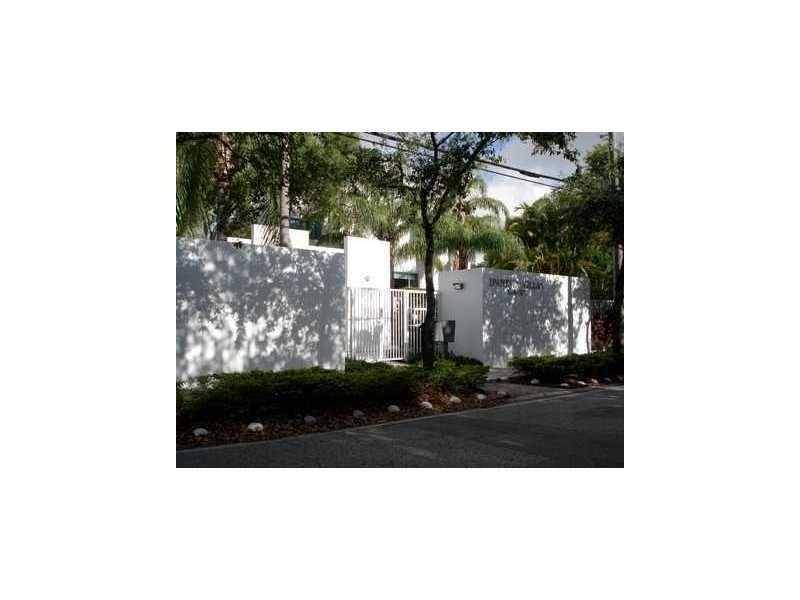 Nestled in a very sought out gated community in the heart of Coconut Grove