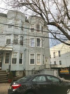 Updated bright & sunny large 3 bedroom apartment in a 3 Family house in Jersey City Heights on a quit tree-lined street