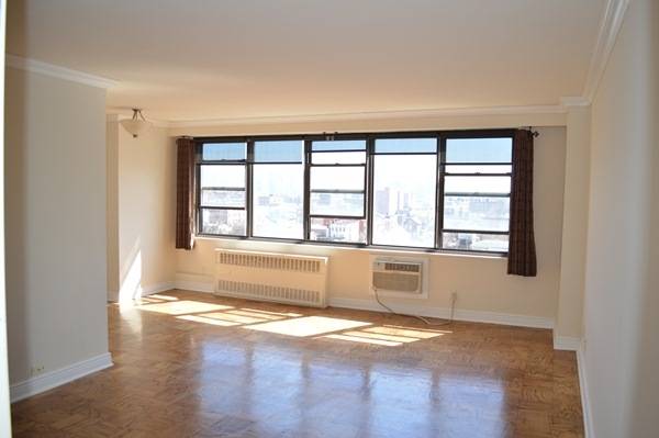Luxury living at The Lenox Condominiums large alcove studio with spectacular views of Empire State Building and Lower Manhattan