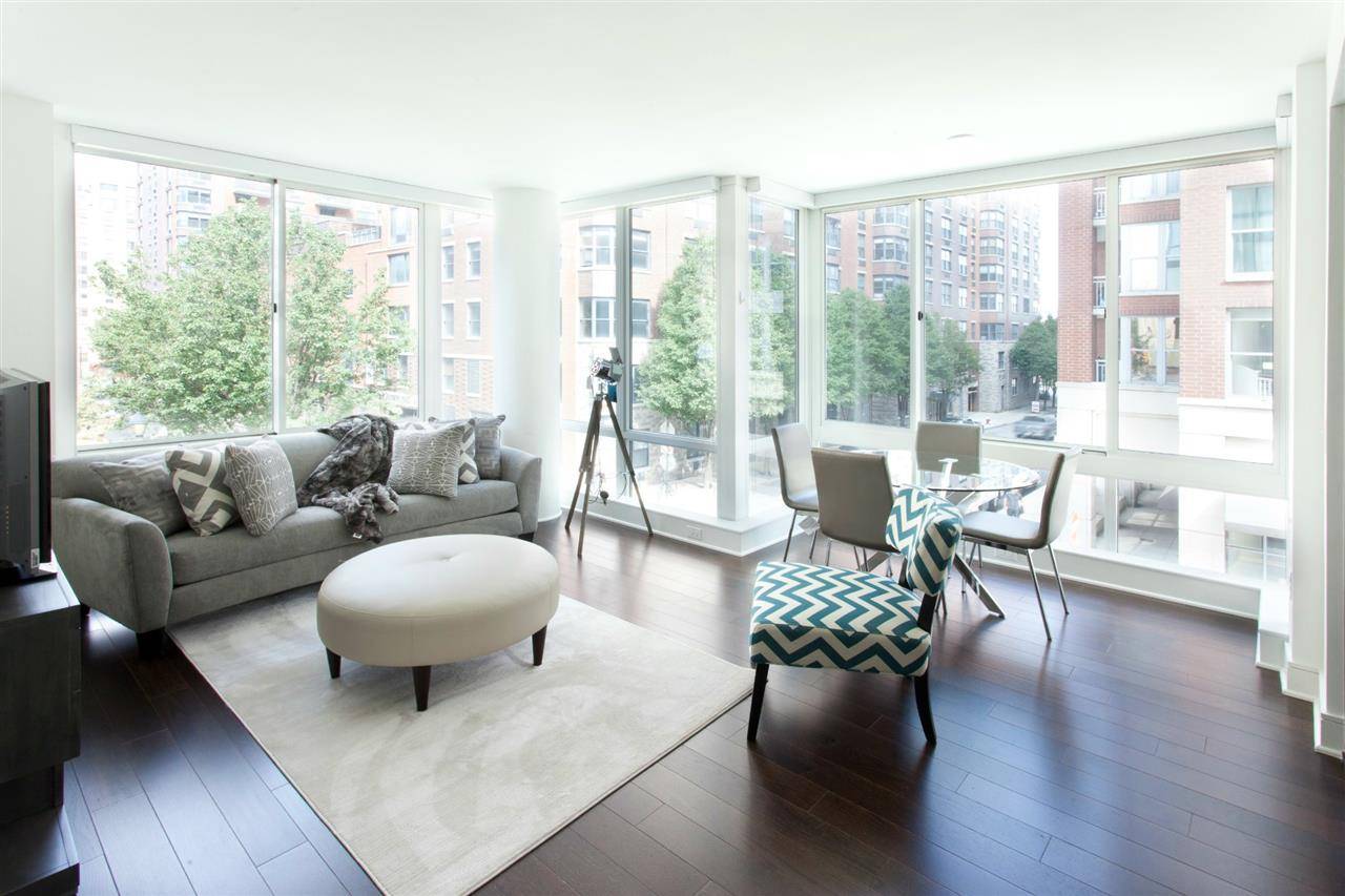 Live in this spacious two bedroom condo with views of the Empire State Building
