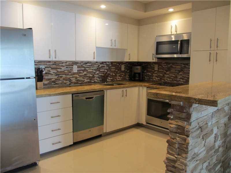 Walk to the beach from this all renovated unit - Oceanview 2 BR Condo Golden Beach Miami