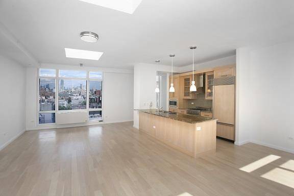 Stunning Soho 2 Bedroom Penthouse Apartment with 2 Baths featuring a Roof Deck and Fireplace