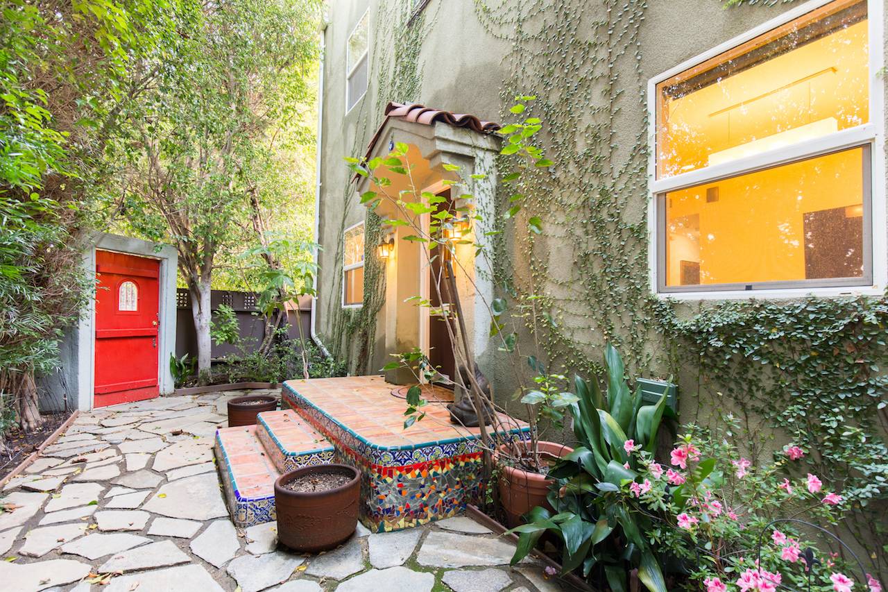 WELCOME TO YOUR STYLISH AND PRIVATE TWO STORY SPANISH RETREAT IN PRIME WEST HOLLYWOOD!