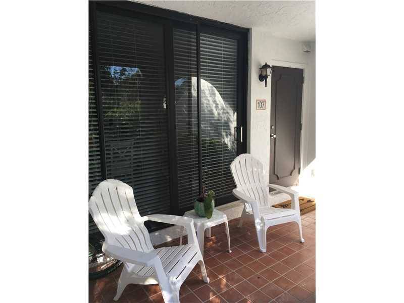 Completely and Beautifully Remodeled Townhouse in quiet street in Key Biscayne with Open Kitchen in highly sought after Grapetree Townhouses