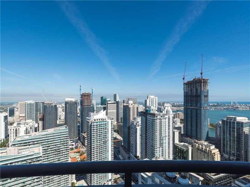 Spectacular split level corner unit with unobstructed views of Brickell & Biscayne Bay