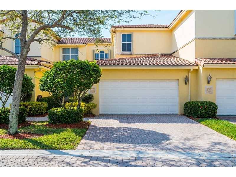 TWO-STORY TOWNHOME LOCATED IN SOUGHT AFTER GATED HARBOR ISLANDS COMMUNITY