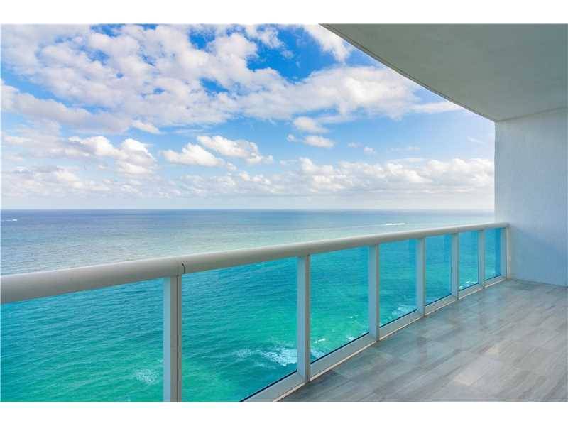 Situated within a sleek 41-story glass tower on the beach