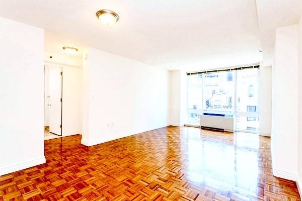 Flatiron's Finest ~ Oversized 1 BR with Hotel Style Service ~ Free Gym & More ~ No Fee!
