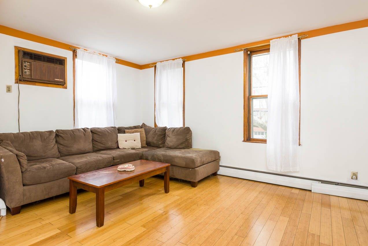 Bright two family home in desirable western slope section of Jersey City