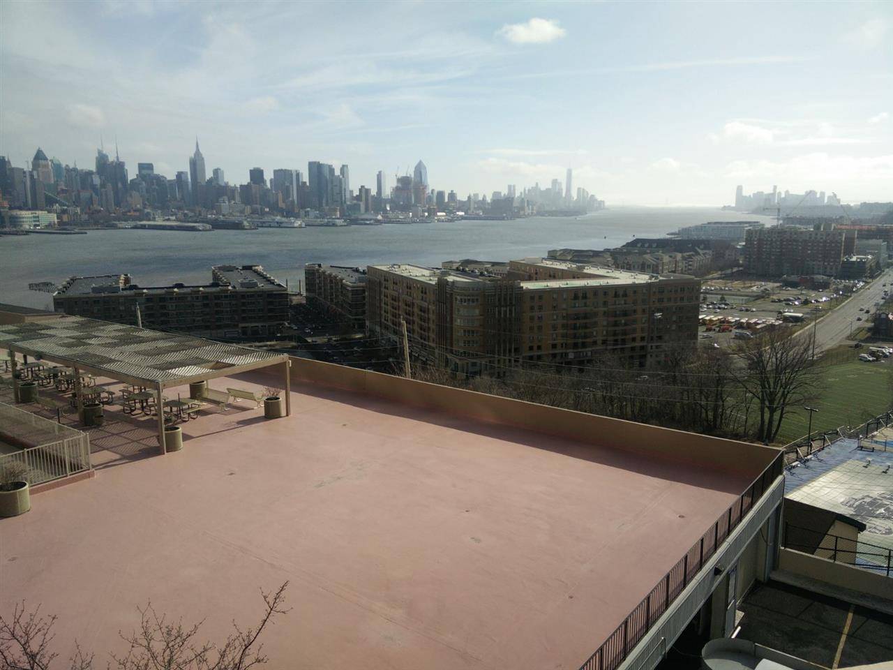 This spacious south east facing apartment has amazing NYC and Harbor Views through all the windows