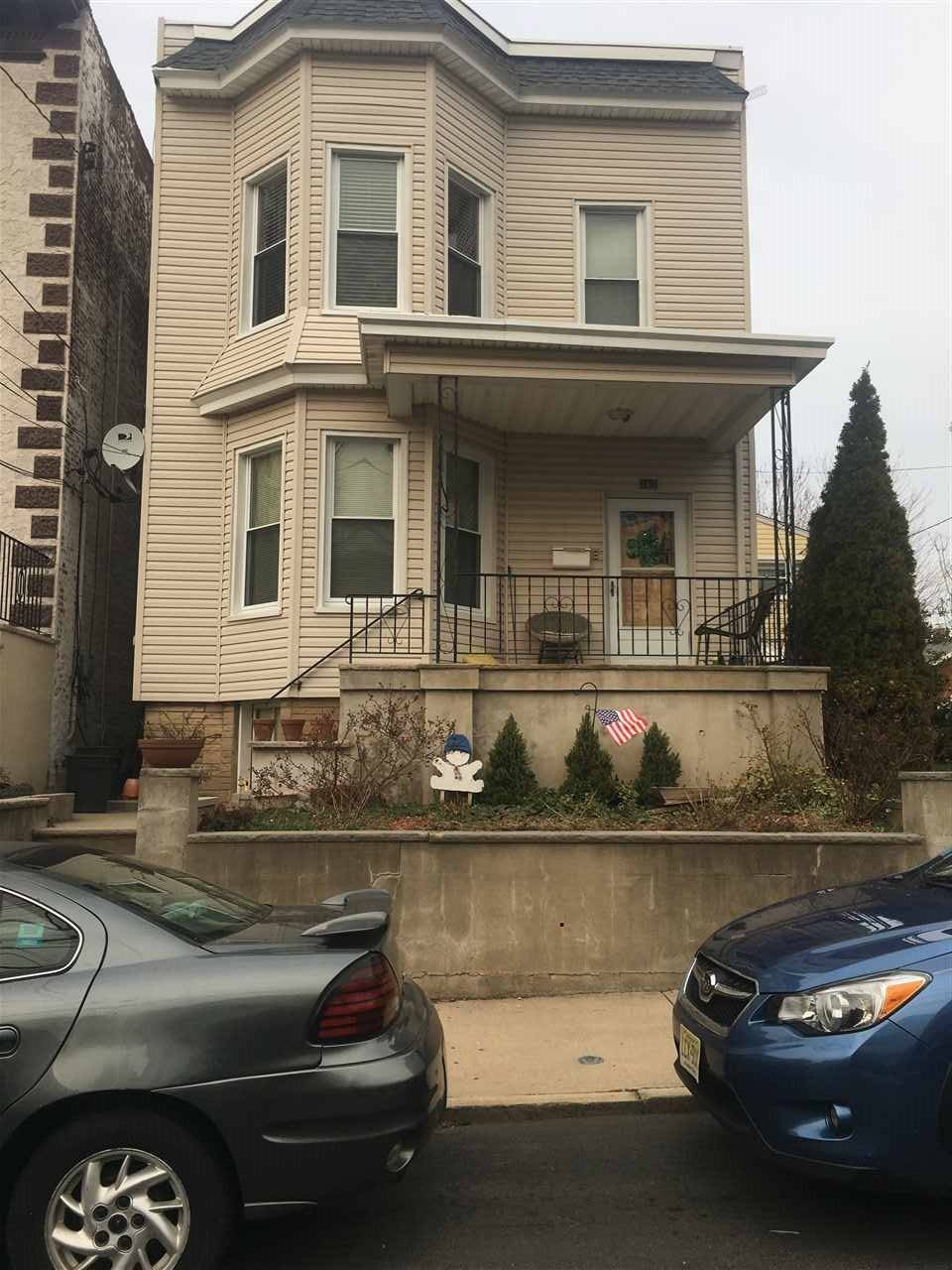 Calling investors legal two family home on north end walking distance to NYC transportation and schools