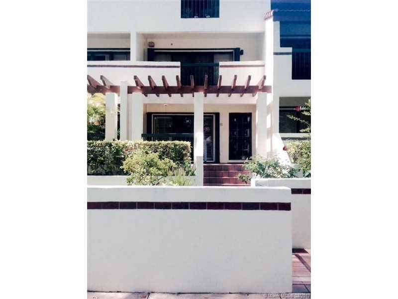 BEAUTIFUL TOWNHOUSE LOCATED IN THE HEART OF CORAL GABLES IN THE BALTIMORE COURT VILLAS CONDO