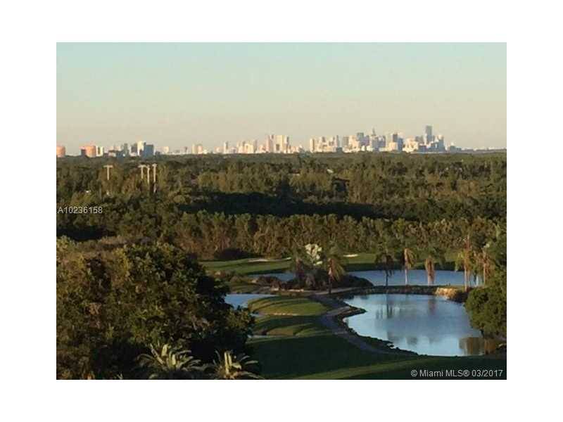 Spectacular post card perfect views from this beautiful 8th floor unit w/ wrap around balcony