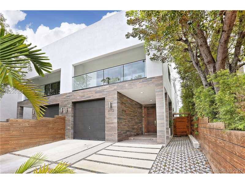 Stunning Tropical-Modern style townhome just steps from the Grove village centers boutiques
