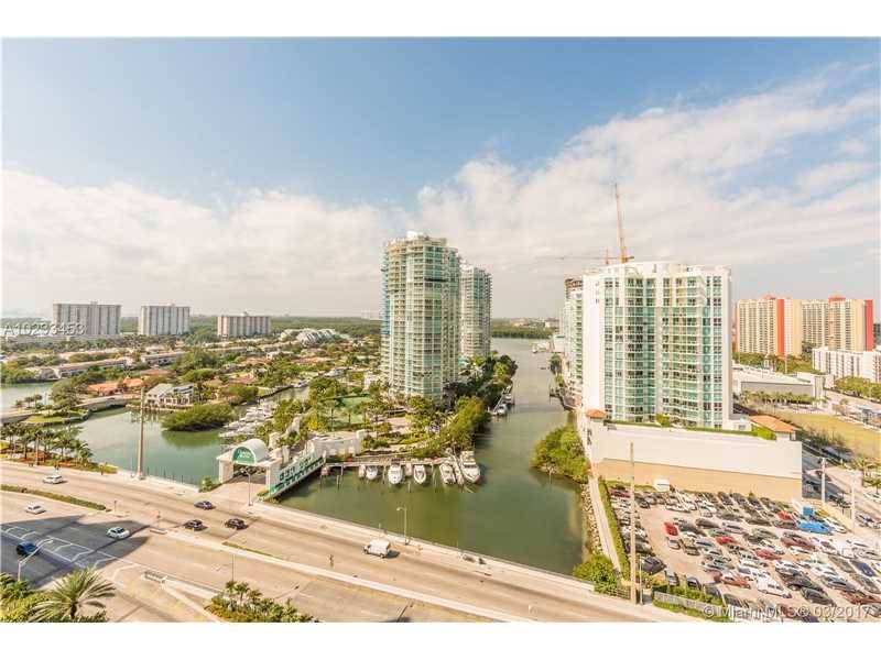 Stunning ocean and intracoastal views from this spacious 2 bed + enclosed den/ 2 bath condo located footsteps away from the sand