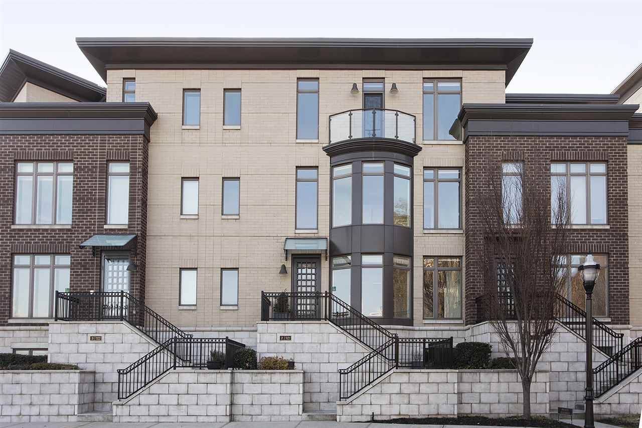 Outstanding 4-story townhome offering views of NYC & the Hudson River