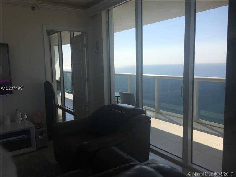 MUST SEE 41ST FLOOR CORNER UNIT WITH A 500 SQ FT WRAP AROUND BALCONY