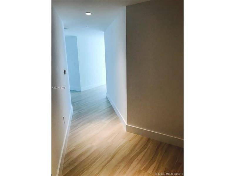 Beautiful Brand New 2/2 with a DEN corner unit (North East) right on the center of Brickell Area
