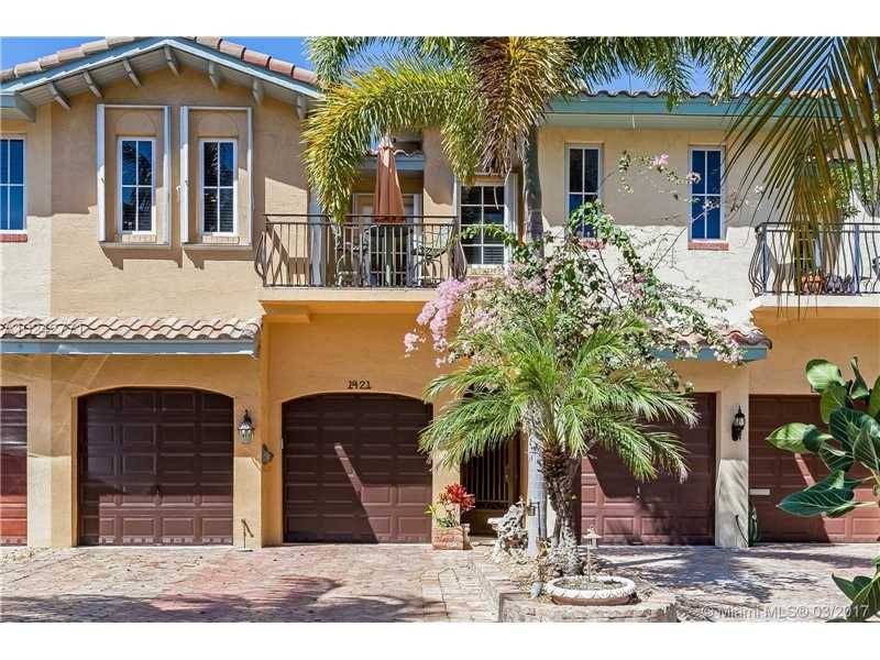 Elegance meets you at the front gate in the beautiful east Ft Lauderdale home