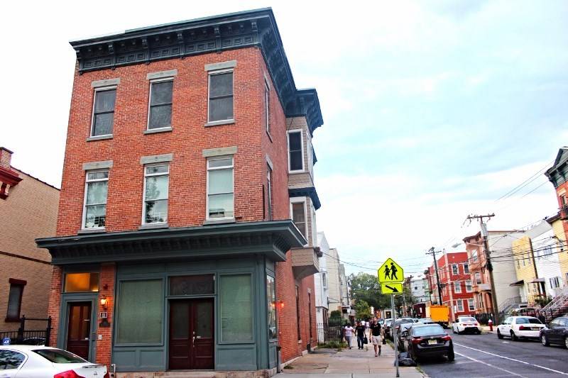 Beautifully restored historic 2 bedroom 2 bath condo with off street parking and outdoor space