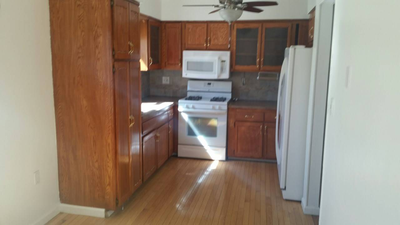 Spacious 3 bedroom 1 bath with natural light shining through-out the whole apartment