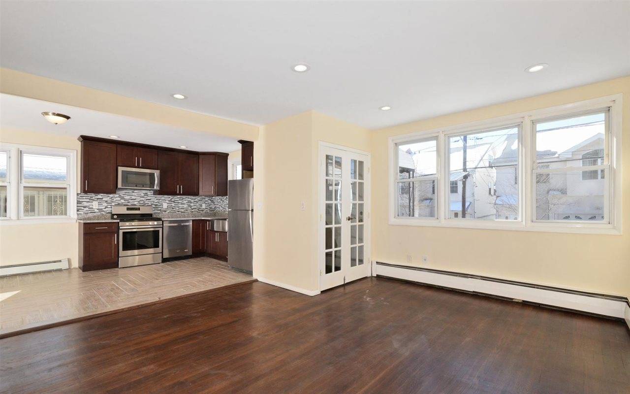 Perfectly renovated 2 family sitting on a 33x100 lot in the Heights