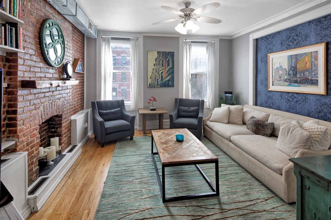 Step into this sought-after Uptown Washington Street location offering classic Hoboken charm with a modern touch that you will fall in love with