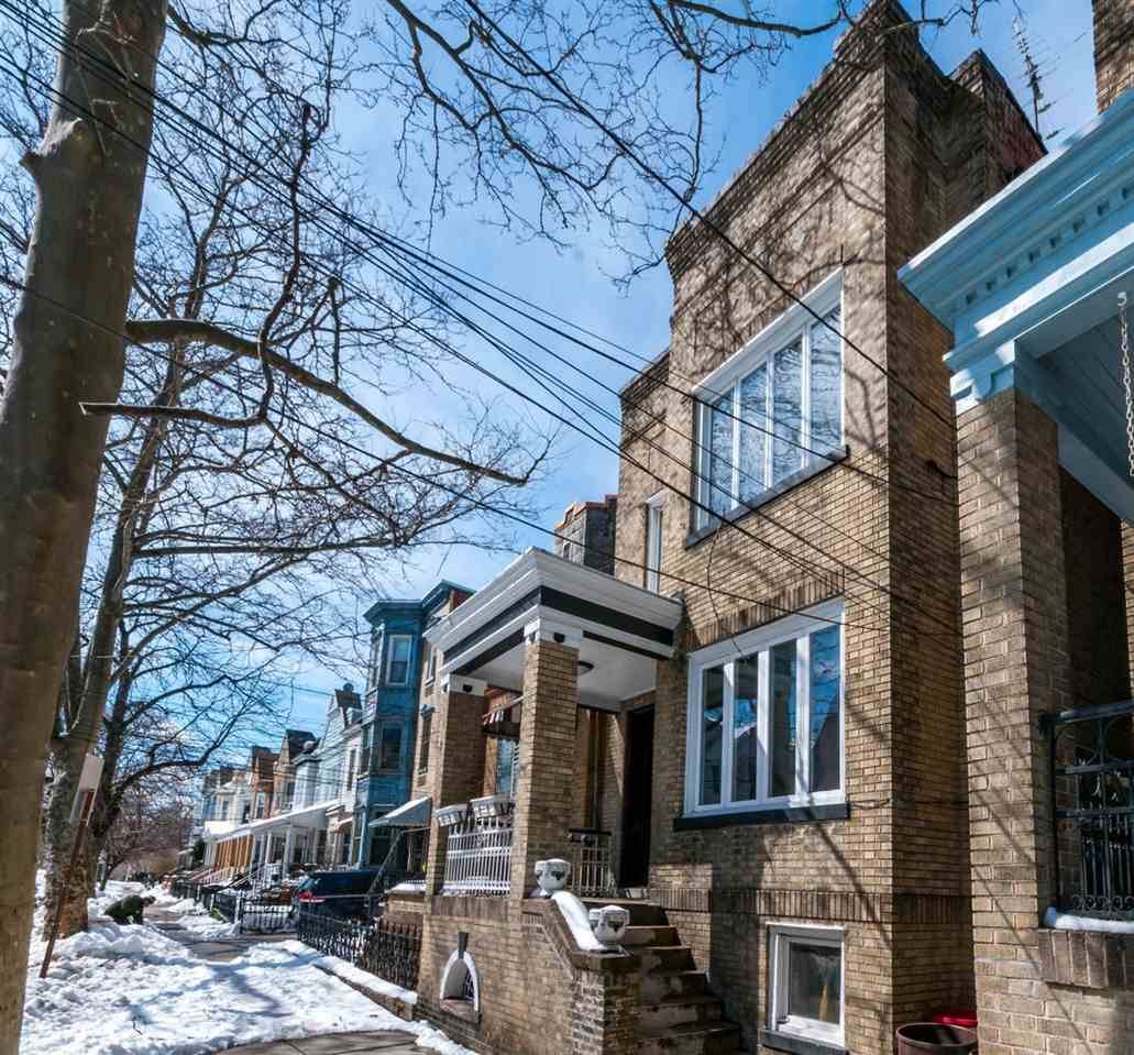 Rare opportunity to own a 2 family brick home on sought after Ogden Avenue