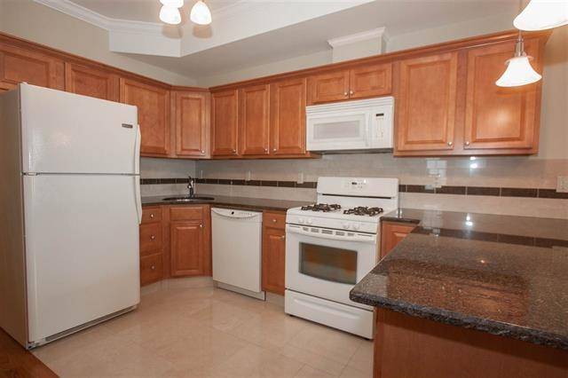 Brand new 3 bedroom/2 bath unit with hard wood floors throughout