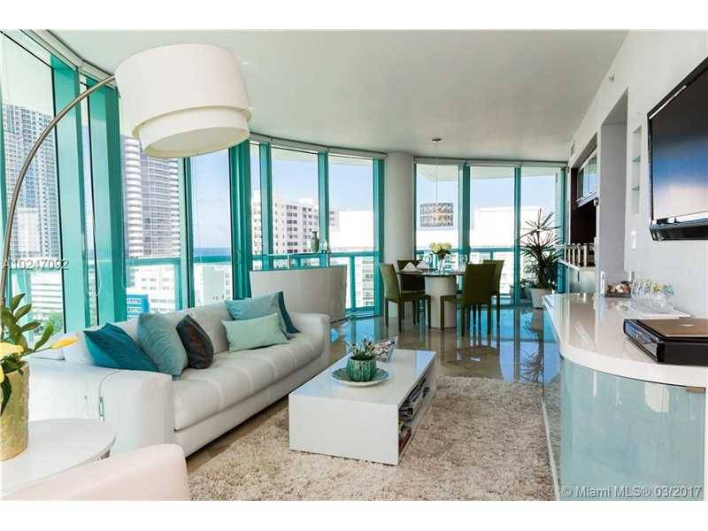 Enjoy stunning 180 degrees view of bay and ocean thru floor to ceiling glass windows