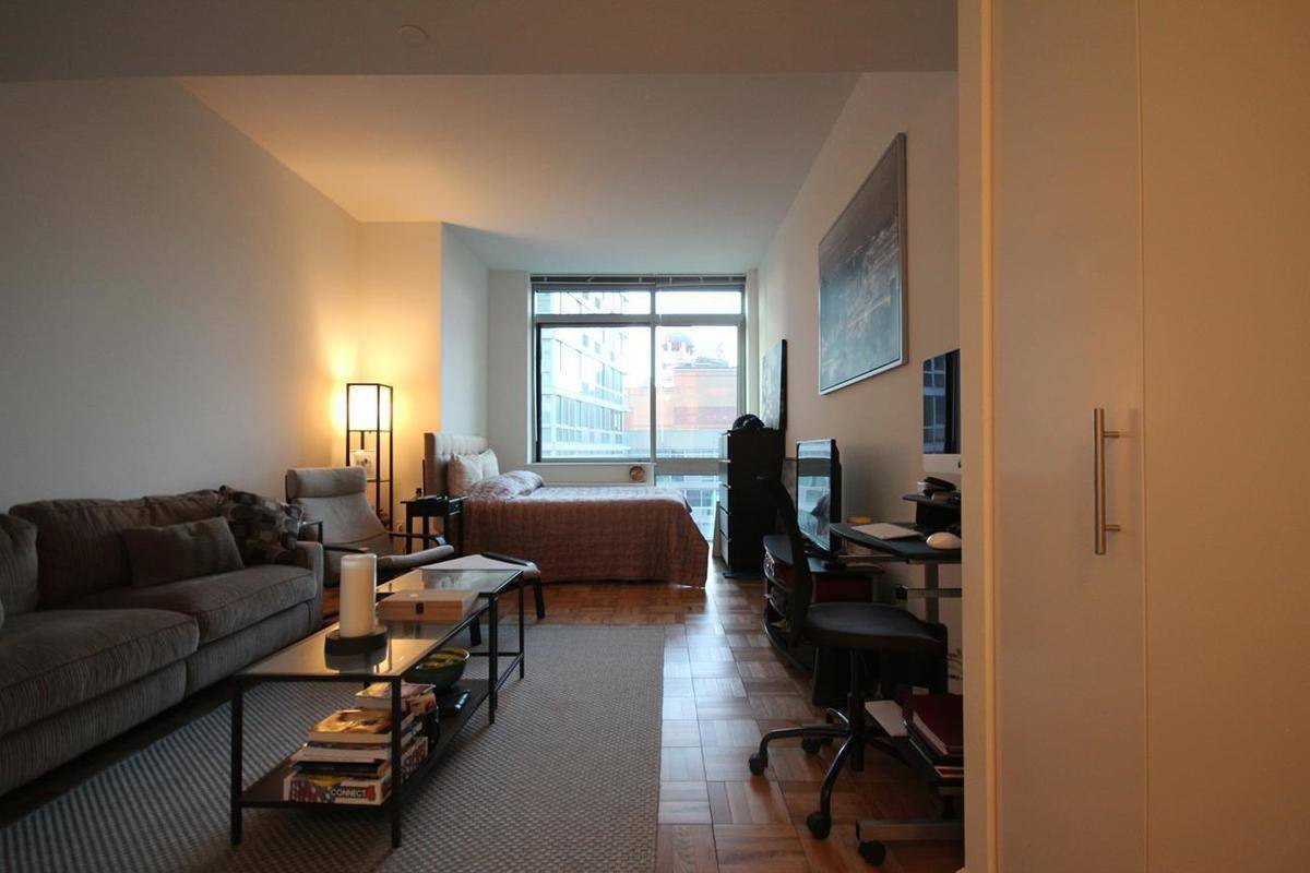 Large Sun Drenched Studio With Floor To Ceiling Windows In A Luxury Doorman Bldg *No Fee*