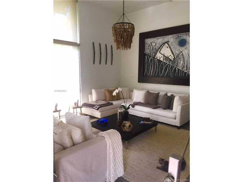 Closest to beach with the feel of a home beautiful modern & bright tri level town home