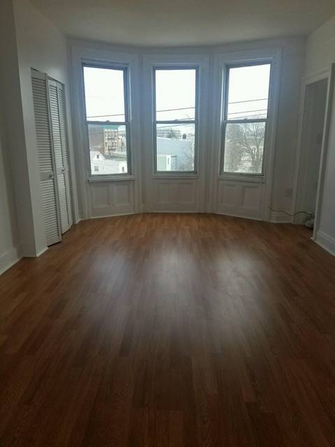 Welcome to this spacious 1 bedroom, 1 bath + den in Journal Square!