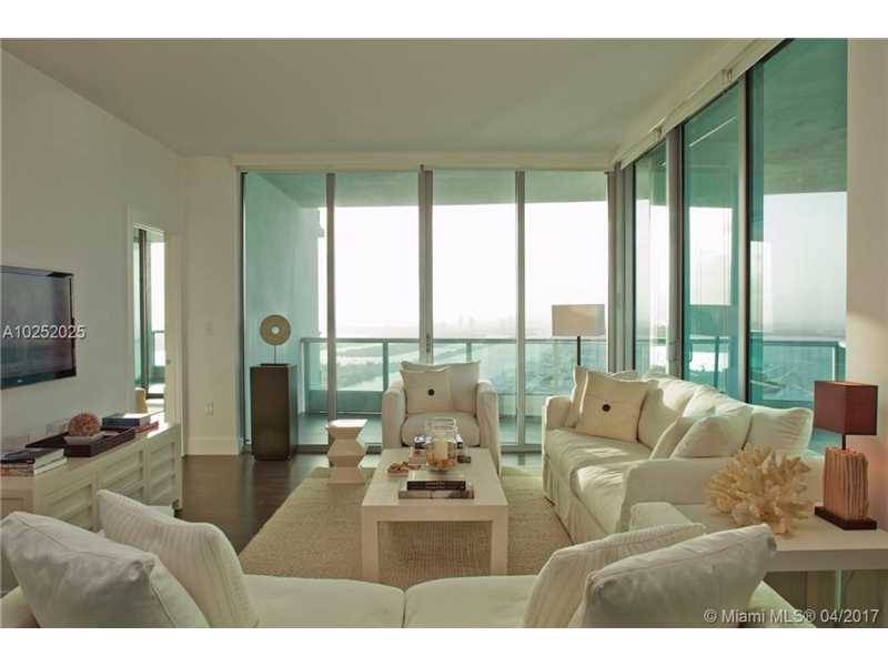The building is an architectural masterpiece with unparalleled views of Biscayne Bay & Ocean