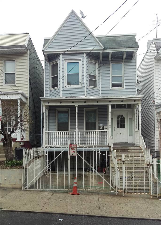 Opportunity to owner occupy and/or rent this large 2 family home in a great JC location