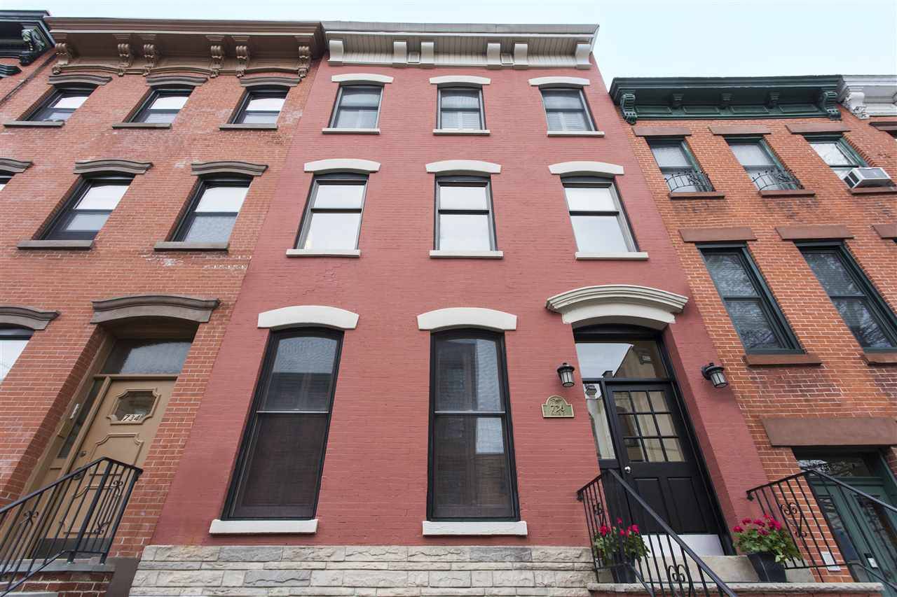 Unique and charming home in a wide historic brick building with two bedrooms