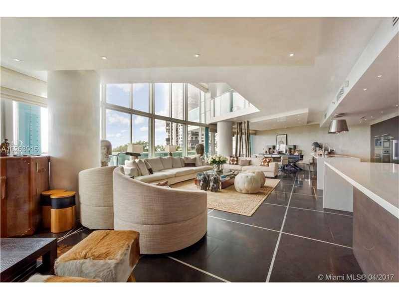 BEAUTIFULLY APPOINTED 2-STORY BAY FRONT CONDO IN BOUTIQUE FULL SERVICE LANDMARK BUILDING