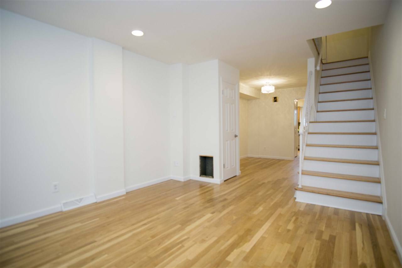 Fully updated townhouse available in highly sought after Hilltop neighborhood of Jersey City