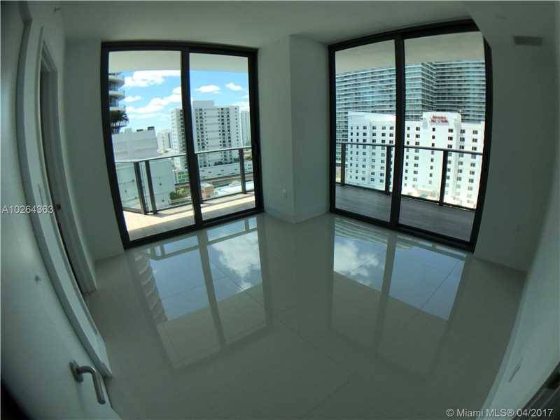 Luxury and brand new unit 2 bedroom/2 baths PLUS DEN with TILE FLOORS Amazing unit at SLS with world class amenities