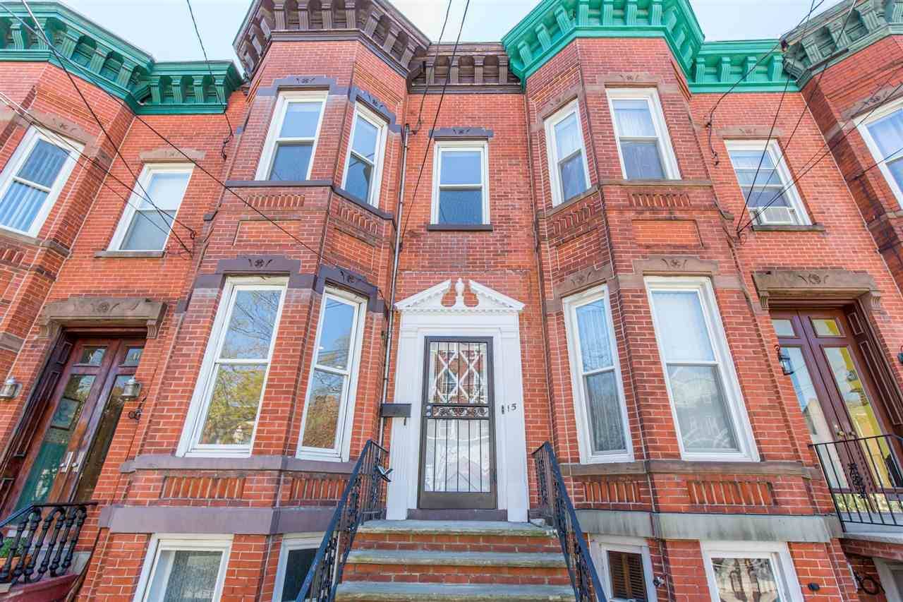 Revived 1890s brick row house is now in its full glory on a comfortable lot size of 16x144
