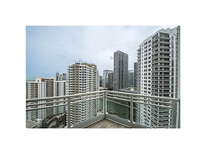 Incredible direct water and city views from this beautiful unit in the Asia Condominium
