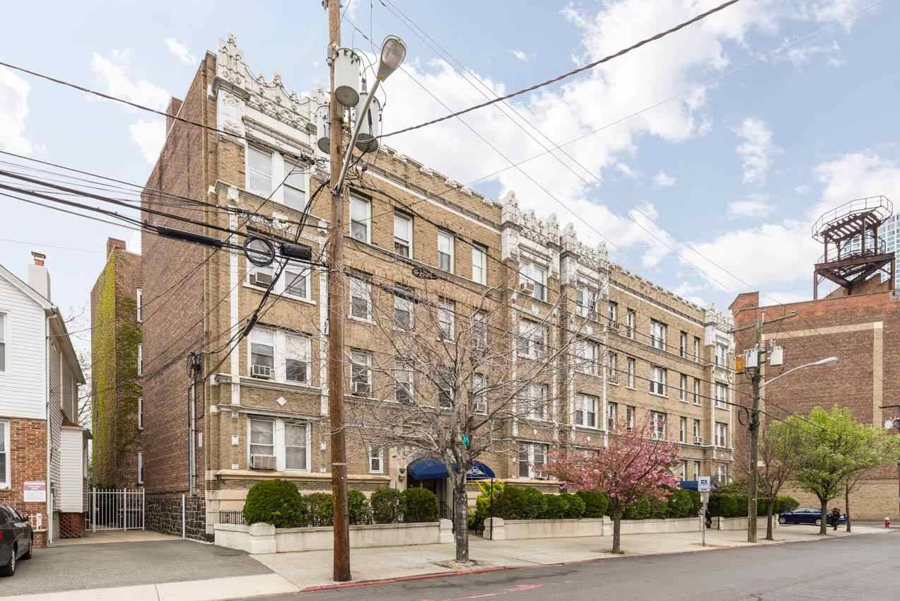 This wonderfully bright south facing 2 bedroom condo for sale in the red hot Journal Square neighborhood is any commuter's dream