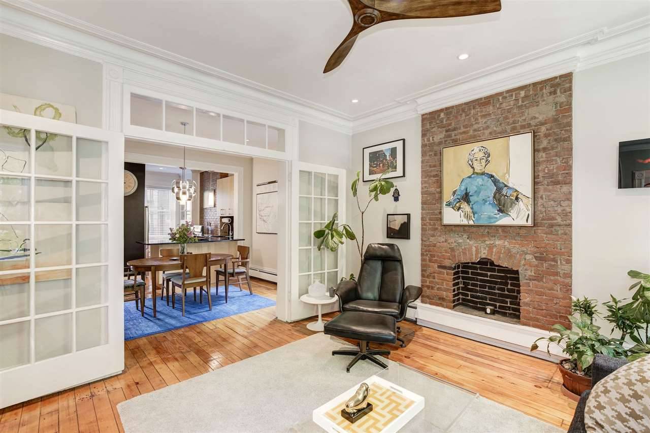 Bright and airy 2 Bedroom condo on a beautiful tree-lined street in the historic Downtown Jersey City just hit the market